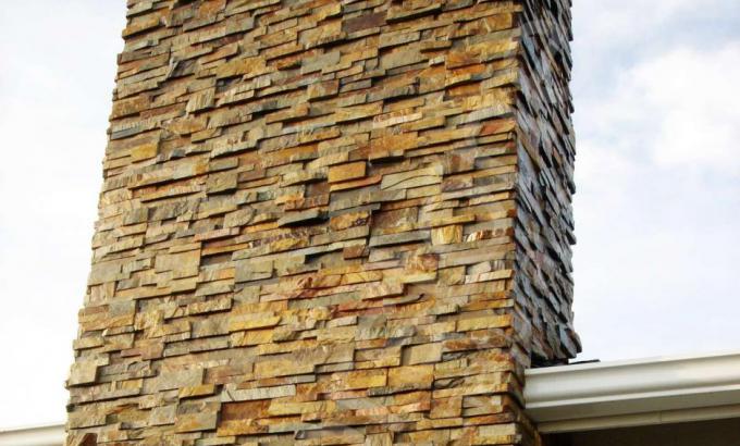 Natural Stacked Stone Veneer Chimney